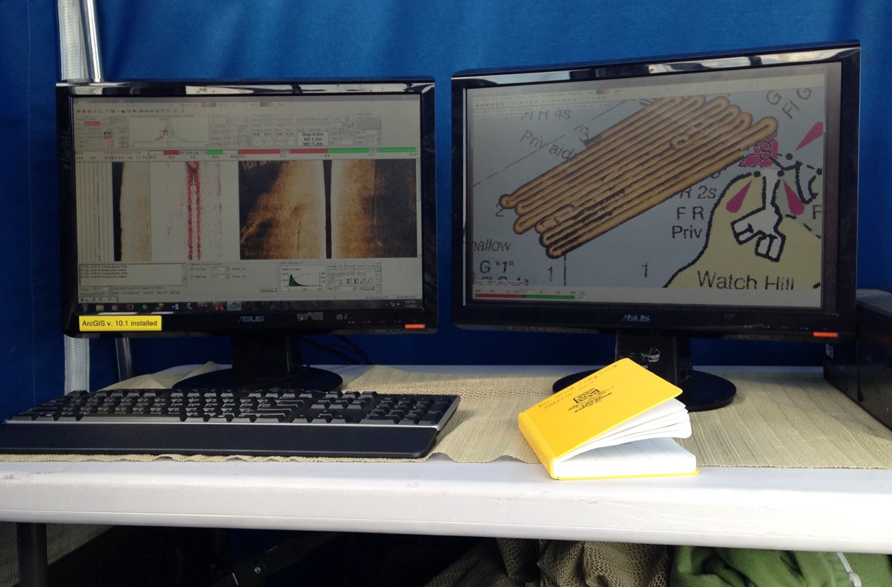 Monitors showing sonar images as they are collected