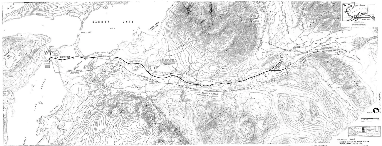 A dark line on a 1961 topographic map shows a planned jeep trail through a valley