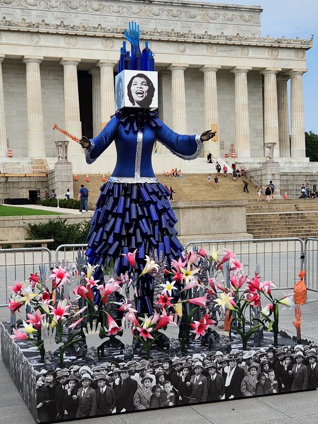 Innovative sculpture of Marian Anderson in Lincoln Memorial plaza using combination of photographs and sculptural elements