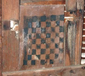 Photo of wooden checkerboard.