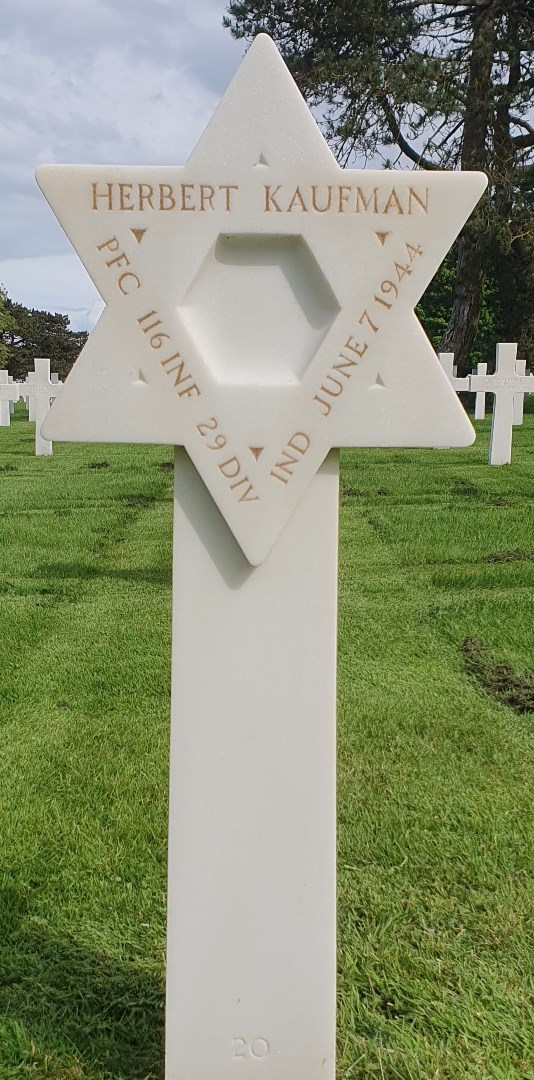 A white Star of David headstone