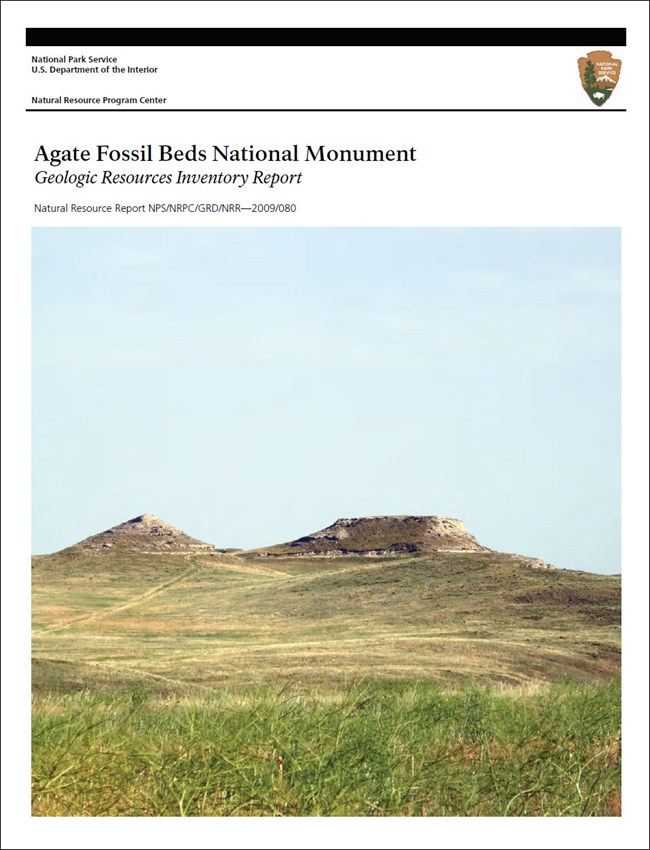 Cover of the geologic report, with a photograph of the monument's grassland