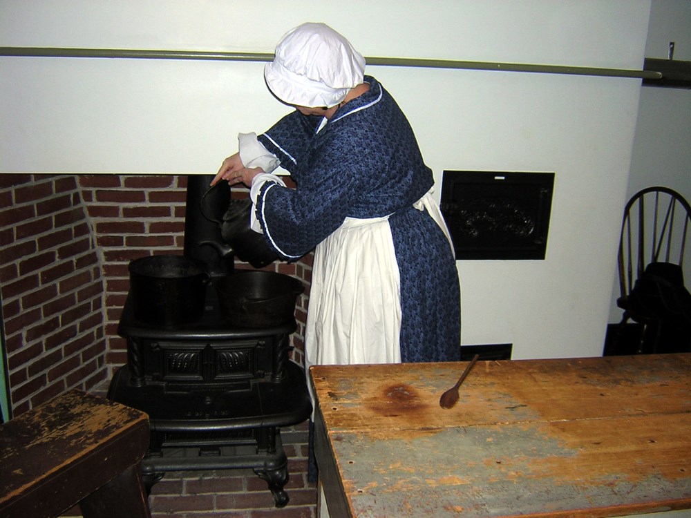 Boardinghouse Keeper at the stove