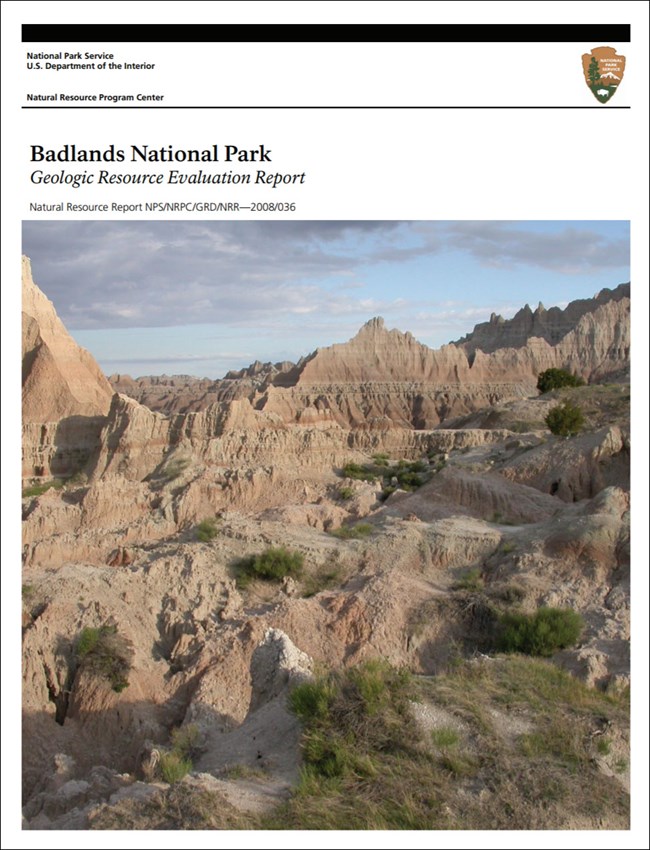 Cover of the Badlands geologic report, with a photograph of the eroded landscape
