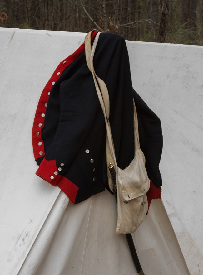 Blue coat on tent